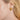 10-11mm Golden South Sea pearl stud earrings worn on ear