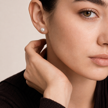 Model wearing 7.0–7.5mm White Akoya Pearl Stud Earrings.