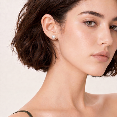 Model wearing 7.5-8.0mm White Akoya Pearl Stud Earrings.
