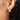 Close-up of Titanium Gray Tahitian Pearl & Diamond Stud Earrings in 18K Gold