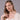 Model wearing 10-11mm white freshwater pearl stud earrings