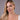 Model wearing pink freshwater pearl stud earrings and necklace
