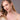 Model wearing white freshwater pearl circle stud earrings