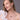 model wearing Black Tahitian Pearl Fish Hook Earrings and Tahitian Pearl pendant