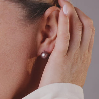 10mm Lavender Freshwater Pearl Stud Earrings worn by a model