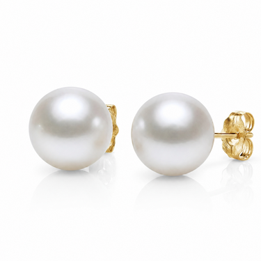 white South Sea round pearl stud earrings with yellow gold backing. 
